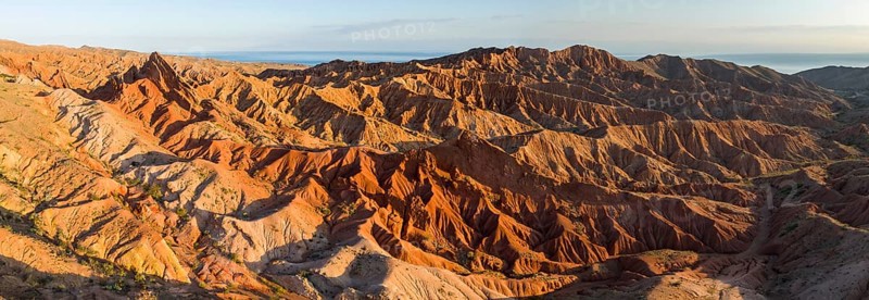 Aerial view, eroded mountain landscape, sandstone cliffs, canyon with red and orange rock formations, Farytale Canyon Skazka, Issyk Kul, Kyrgyzstan, Asia