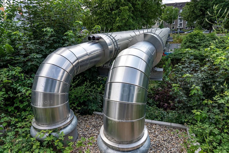 New STEAG district heating pipeline in Essen, over the railway tracks of the S6 line in Essen-Süd, part of the new 12 km long eastern route through the city, North Rhine-Westphalia, Germany, Europe