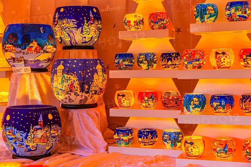 Colourful tea lights in a stall at the Christmas market at City Hall, Vienna, Austria, Europe