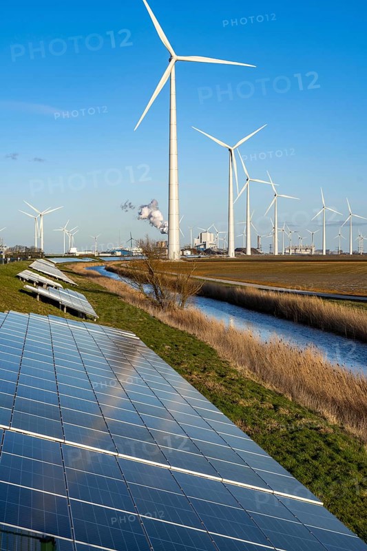 Solar park on the Slaperdijk dyke near the Eemshaven, test project, 17, 000 solar modules were installed over a good 5 kilometres, the Netherlands has over 22, 000 kilometres of dyke line, here it is being tested whether such an installation is successful and can be expanded, wind farm, Groningen, Netherlands