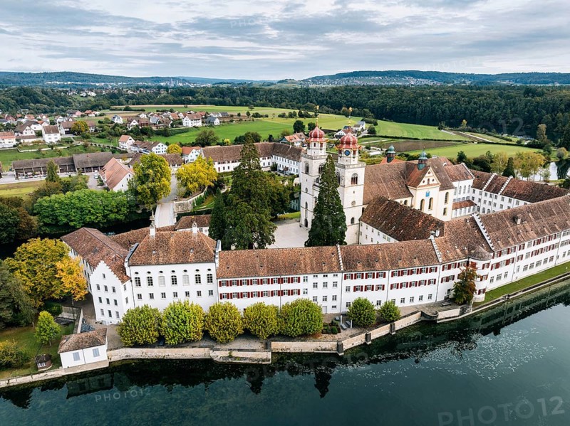 Aerial view of the former Benedictine abbey with the monastery church of St Mary on the Rhine island of Rheinau, Andelfingen, Canton Zurich, Switzerland, Europe