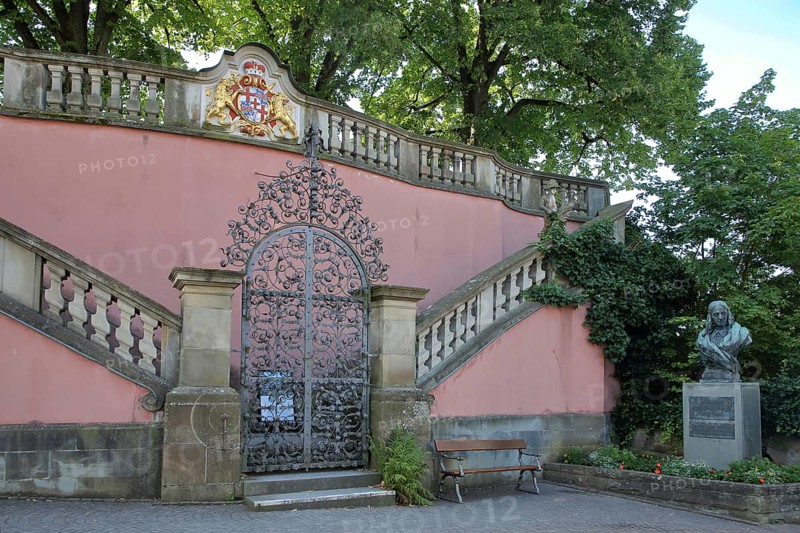 Entrance to the garden through metal gate with coat of arms and monument with bust of Annette von Droste-Hülshoff, parapet, New Castle, Meersburg, Obersee, Lake Constance, Lake Constance area, Baden-Württemberg, Germany, Europe