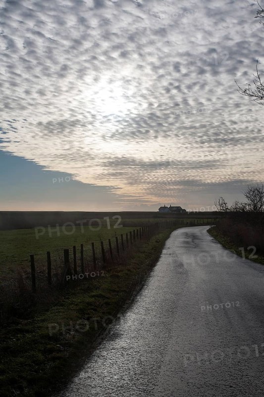 A mackerel sky or buttermilk sky of altocumulus clouds over Shingle Street, Suffolk, England, United Kingdom, Europe