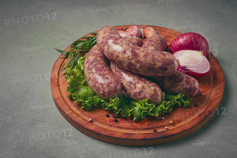 Raw kupaty, traditional Georgian sausages, raw sausages, with spices and herbs, Georgian cuisine