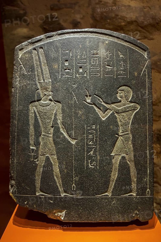 The Padichahededet stele showing Egyptian hieroglyphs and the god Amun dating to the 26th Dynasty