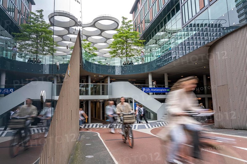 Entrance and exit of the bicycle car park at Utrecht Centraal station, Stationsplein, over 13, 000 parking spaces, considered the largest bicycle car park in the world, over 3 underground floors, Utrecht, Netherlands