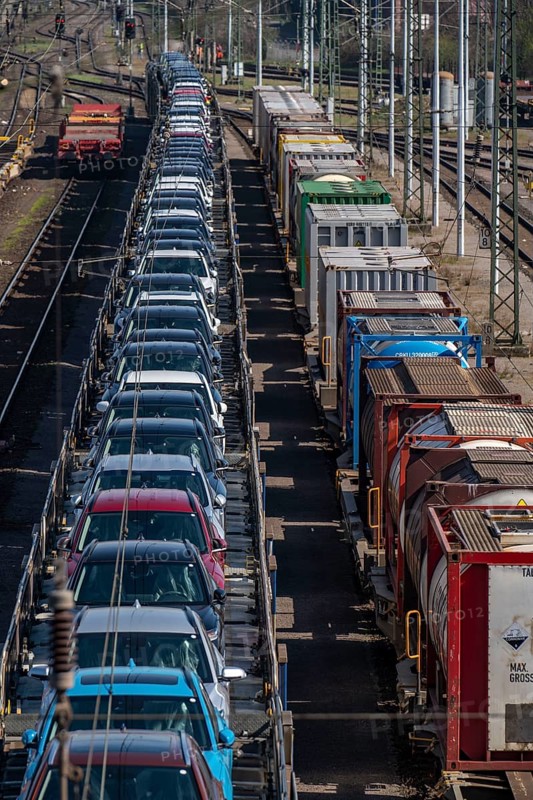 Duisburg-Rheinhausen freight station, at the Logport harbour area, goods trains loaded with new cars, various tank containers, Duisburg, North Rhine-Westphalia, Germany, Europe