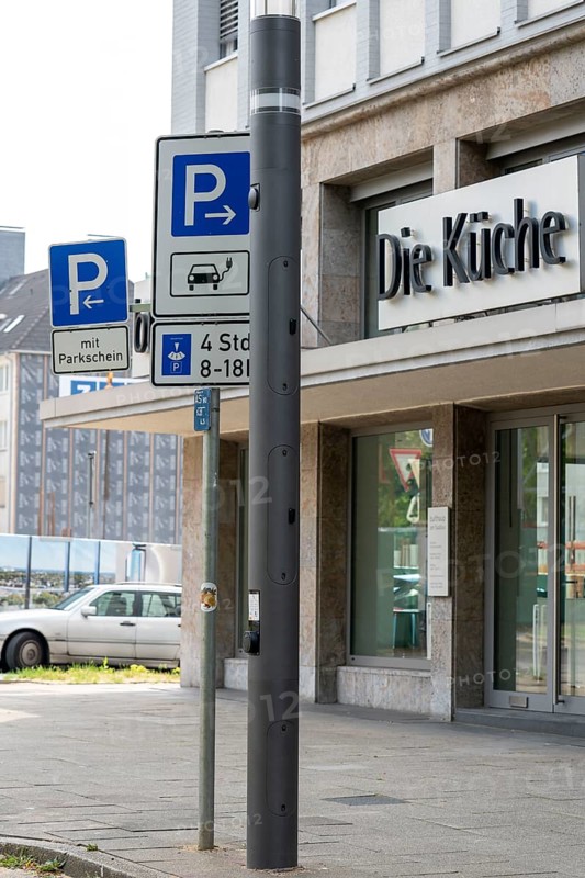 E-charging station in new smart poles, intelligent street lamps, test run, EON and the city of Essen are testing street lamps that measure environmental data, offer electricity for electric cars, are parking guidance systems, offer WLAN, are emergency call pillars and digital display panels, Essen, North Rhine-Westphalia, Germany, Europe