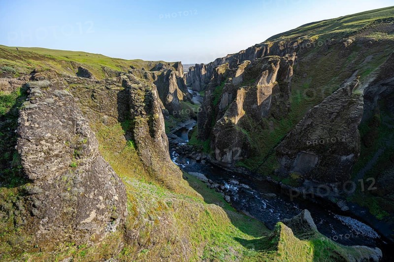 Fjaðrárgljúfur Canyon, Fjadrargljufur, rock formations in rugged deep canyon with river in the evening light, near Kirkjubæjarklaustur, South Iceland, Iceland, Europe