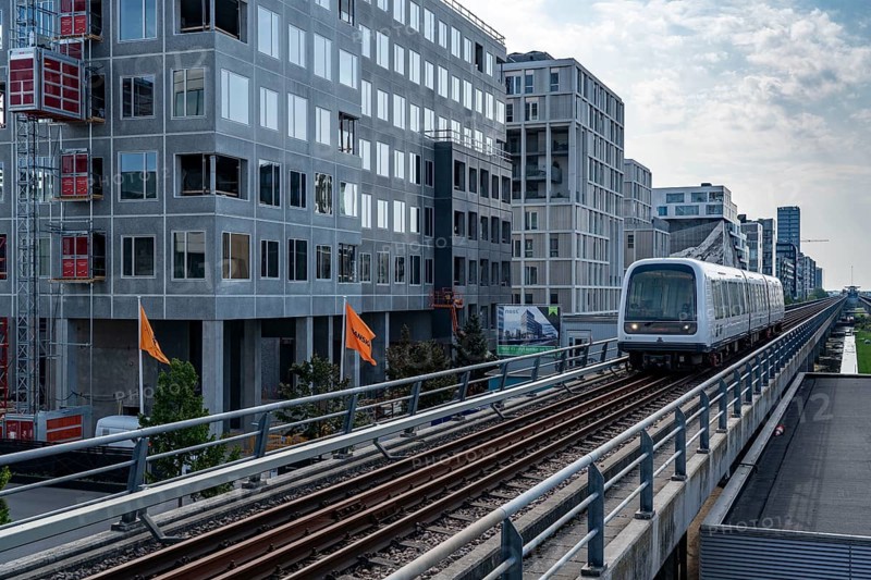 Ørestad district, youngest district of Copenhagen, on the island of Amager, planned in 1992 and still under construction, elevated railway line of the M1 metro line, Copenhagen, Denmark, Europe