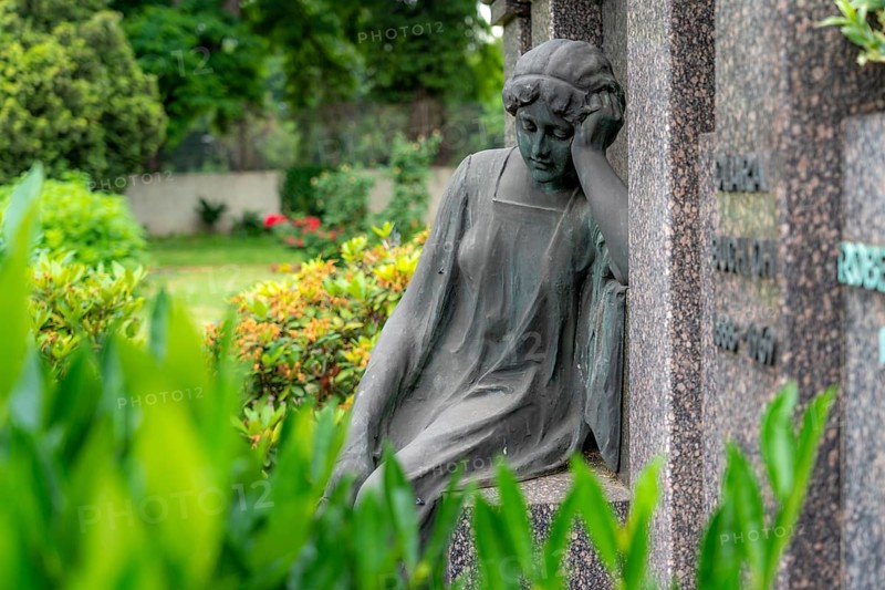 Figure in a cemetery, family grave, old gravestone, with flower and grave light, North Rhine-Westphalia, Germany, Europe