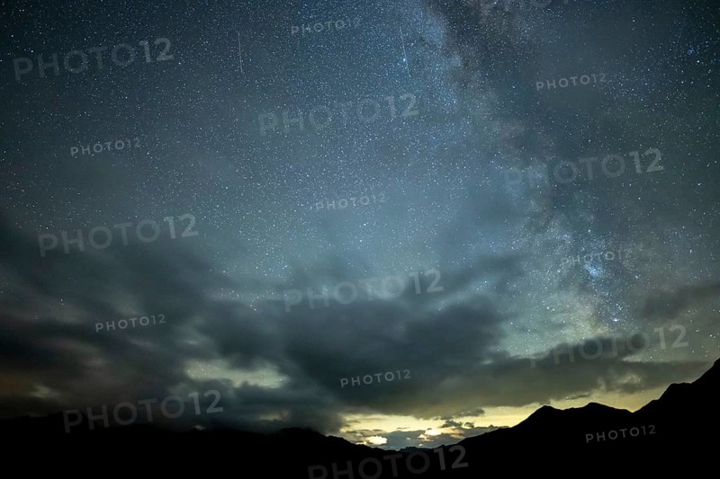 Milky Way and starry sky with Montafon mountains, Tschagguns, Rätikon, Montafon, Vorarlberg, Austria, Europe