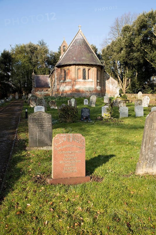 Holy Trinity Village parish church Oare, Wiltshire, England, UK built 1858 red brick Victorian nineteenth century building