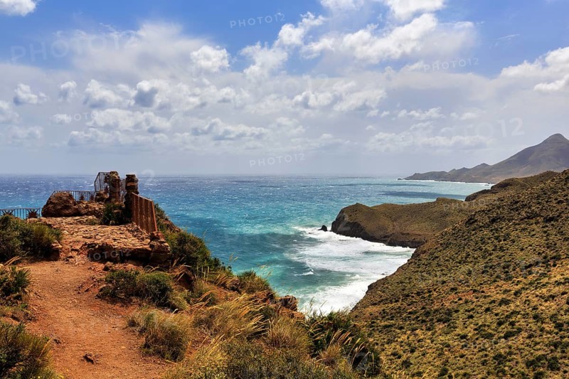 Mirador de La Amatista with view of rocky coast, coastline at La Isleta, sunny weather, typical light mood, Almeria, Cabo de Gata, Cabo de Gata-Nijar, Spain, Europe
