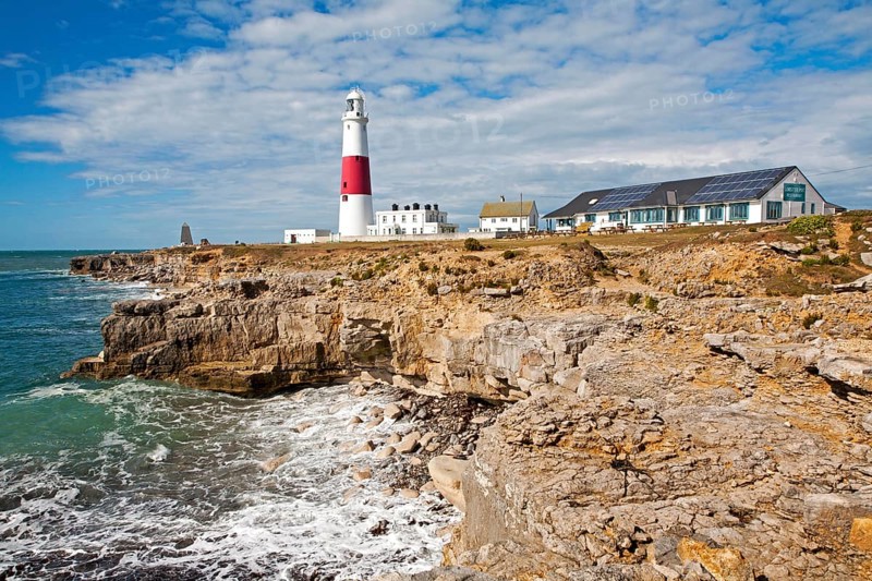 Red and white lighthouse on the coast at Portland Bill, Isle of Portland, Dorset, England, United Kingdom, Europe
