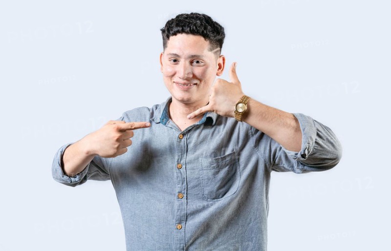 Interpreter person gesturing CALL ME in sign language isolated. Smiling people gesturing CALL ME in sign language