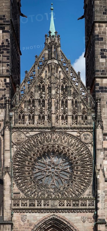 Gothic rose window with central pediment from the main portal of St SLorenz, Nuremberg, Middle Franconia, Bavaria, Germany, Europe