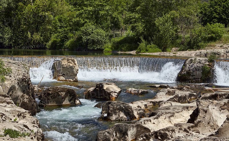 Waterfalls of the Cèze of the cascades of Sautadet through limestone cliffs in La Roque-sur-Cèze, Gard department, Occitanie region, France, Europe