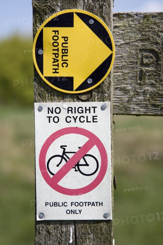 Public footpath sign no right to cycle sign close up, Suffolk, England, UK