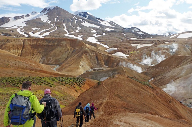 Hikers travelling in a desert-like, geothermally active mountain region, fire and ice, Kerlingarfjöll, Iceland, Europe