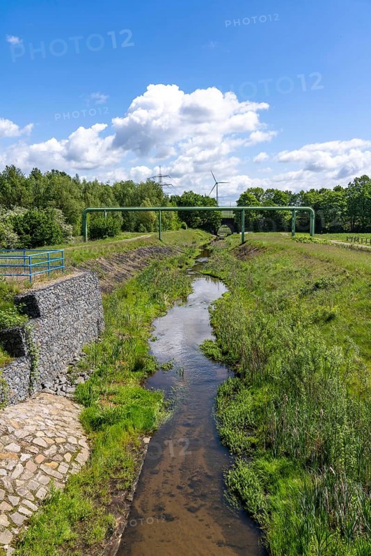 The Boye, stream, runs for 13.8 km through the cities of Gladbeck, Bottrop (photo) and Essen, a former sewer, wastewater river, since 2017 the wastewater has been canalised, the Boye is wastewater-free and in large parts, as here in Bottrop, renaturalised, part of the Emscher conversion project, North Rhine-Westphalia, Germany, Europe