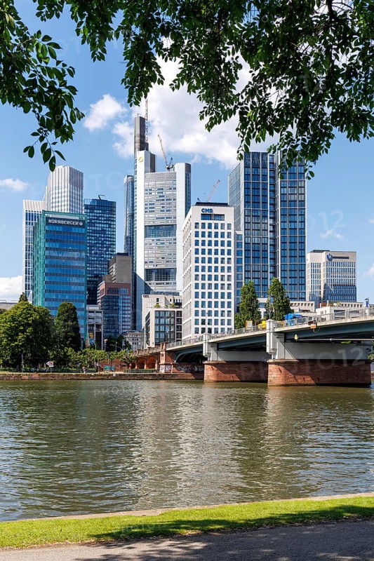 Skyline with skyscrapers in the city centre, river Main and Untermainbrücke in Frankfurt, Germany, Europe