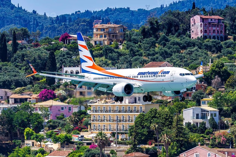 A Smartwings Boeing 737 MAX 8 aircraft with the registration OK-SWD at Corfu Airport, Greece, Europe