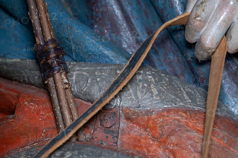 Inscription on the hem of Christ's cloak, detail of the palm tree, wooden figure from around 1470, Church of St Jodokus, Bad Oberdorf, Oberallgäu, Bavaria, Germany, Europe