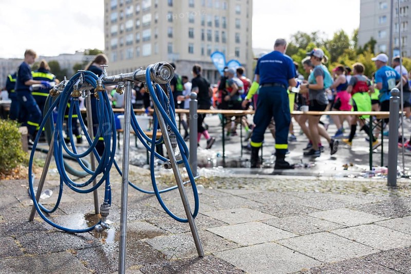 Water supply by the THW (Federal Agency for Technical Relief) on Karl-Marx-Allee at the 50th BMW Berlin Marathon 2024 on 29 September 2024