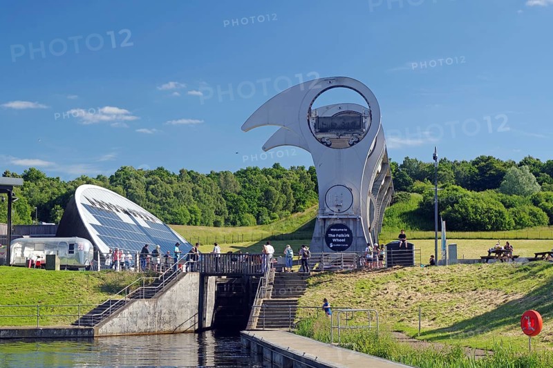 The Falkirk Wheel, a modern architectural structure, lifts boats in a hilly landscape, Forth and Clyde Canal, Scotland, United Kingdom, Europe