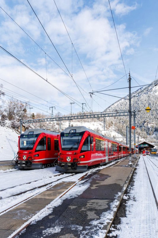 Rhaetian Railway trains on the Albula railway Stadler Rail passenger train at Filisur station, Switzerland, Europe
