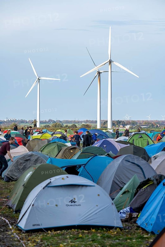 Protest action against the demolition of the village of Lützerath in the Rhenish lignite mining area, which is to make way for the expansion of the Garzweiler II open-cast mine, several thousand participants at the demonstration in Lützerath, tent camp of Ende Gelände activists, North Rhine-Westphalia, Germany, Europe