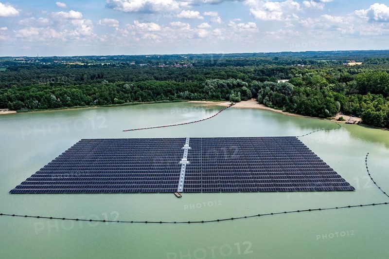 Germany's largest floating solar power plant on the Silbersee III, a quarry pond no longer used for sand mining, near Haltern am See, operated by Quarzwerke GmbH, around 5800 solar modules, on an area of a good 2 football pitches, generate 3.1 megawatts of power, the company uses the electricity itself on weekdays, at weekends it flows into the public grid, North Rhine-Westphalia, Germany, Europe