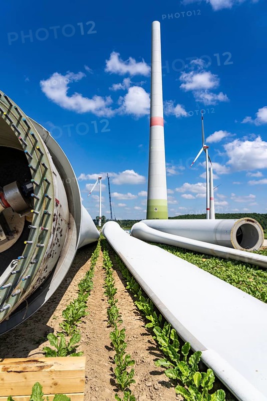 Repowering of a wind farm, near Brilon-Radlinghausen, 2 old turbines are demolished, rotors and dome are already on the ground and 4 new wind turbines are erected, each with a hub height of 160 metres, each with an output of 4.2 MW, North Rhine-Westphalia, Germany, Europe