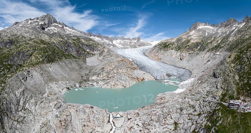 Rhone glacier, valley glacier in the headwaters of the Rhone in the Swiss Alps. Melting glacier, the glacier is getting smaller and smaller. Drone photo. Obergoms, Canton Valais, Switzerland, Europe