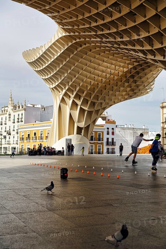 Inline skaters and pedestrians on the Plaza Mayor, Metropol Parasol, Seville, Andalusia, Spain, Europe