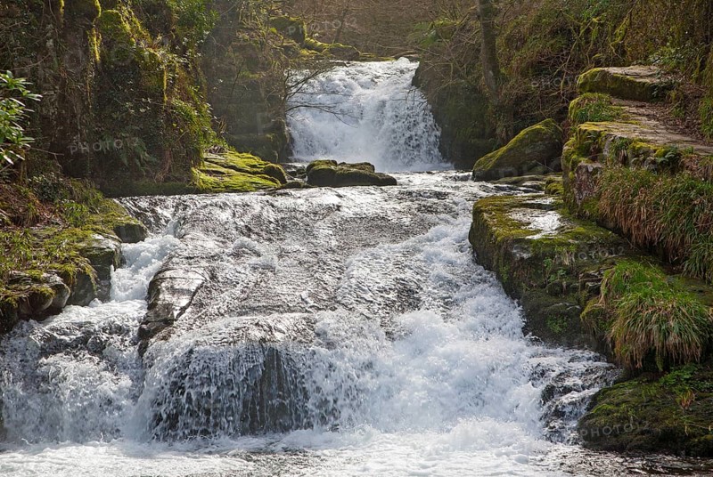 Hoar Oak Water river waterfall at Watersmeet, Lyn Valley, near Lynmouth, Exmoor national park, Devon, England, United Kingdom, Europe