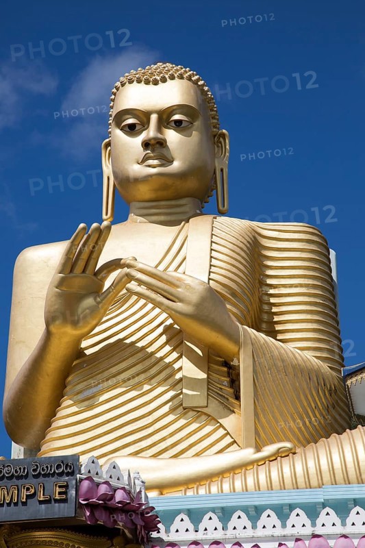 Giant Golden Buddha statue at Dambulla cave temple complex, Sri Lanka, Asia