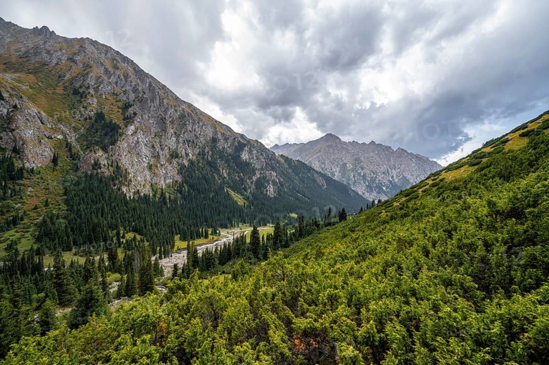 Green mountain valley with river and steep mountain peaks, Chong Kyzyl Suu Valley, Terskey Ala Too, Tien-Shan Mountains, Kyrgyzstan, Asia