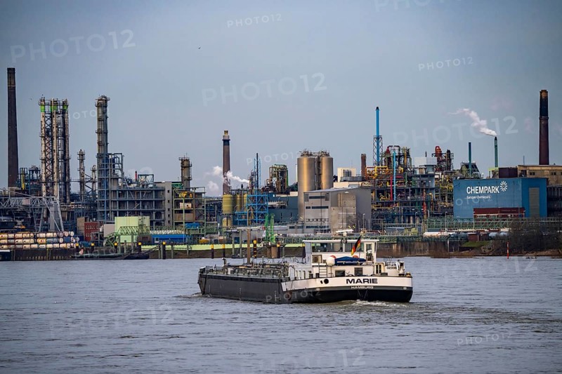 Backdrop of Chempark Leverkusen, Bayer Leverkusen, chemical park, chemical plant, river Rhine, cargo ship, Leverkusen, North Rhine-Westphalia, Germany, Europe