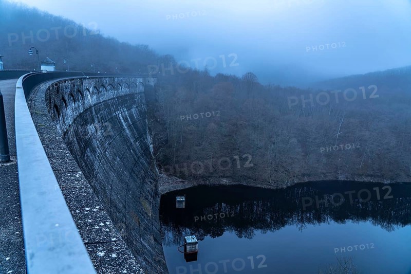 The dam wall of the Urft dam, in the Eifel, reservoir, in winter, fog, near Schleiden, North Rhine-Westphalia, Germany, Europe