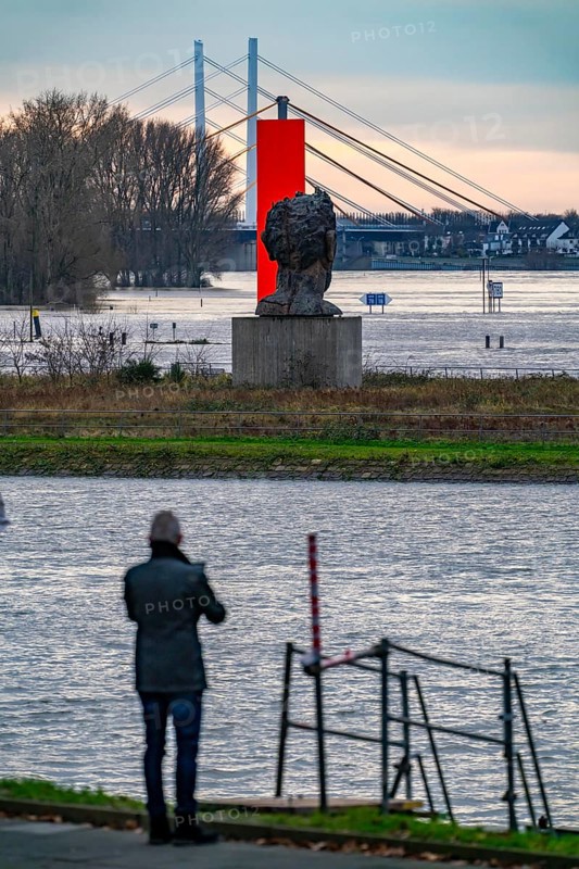 Flood on the Rhine near Duisburg, Rhine bridge Neuenkamp, old and new construction, landmark Rhine orange, washed by the flood, sculpture The Echo of Poseidon, on Mercator Island, washed by the flood, North Rhine-Westphalia, Germany, Europe
