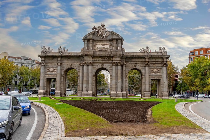 The Puerta de Alcalá is a Neo-classical gate in the Plaza de la Independencia in Madrid, Spain, Europe