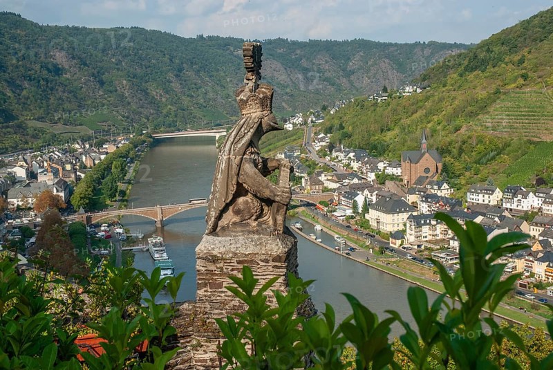 Statue at Reichsburg Castle and view of the Mosel Valley at Cochem, Rhineland-Palatinate, Germany, Europe