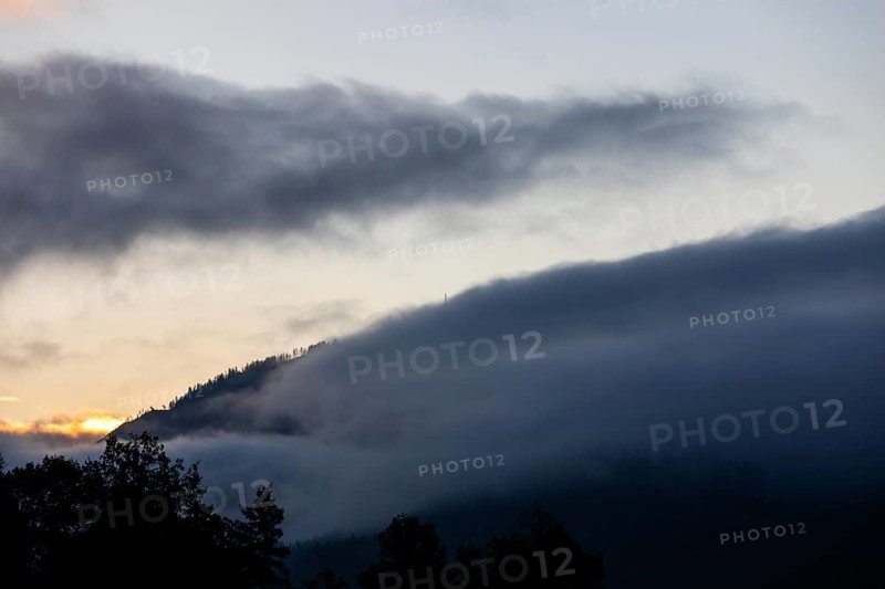 Autumn atmosphere, wafts of mist over a mountain range, Mugel mountain, Leoben, Styria, Austria, Europe
