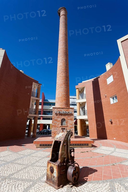 Chimney of industry in Portimao, Algarve, Portugal, Europe