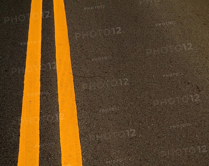 Double Yellow Marking Lines On A Road With Copy Space
