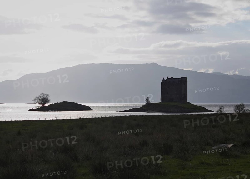 Castle Stalker is a tower house about 2. 5 kilometres northeast of Port Appin, a village in Argyll and Bute in Scotland.