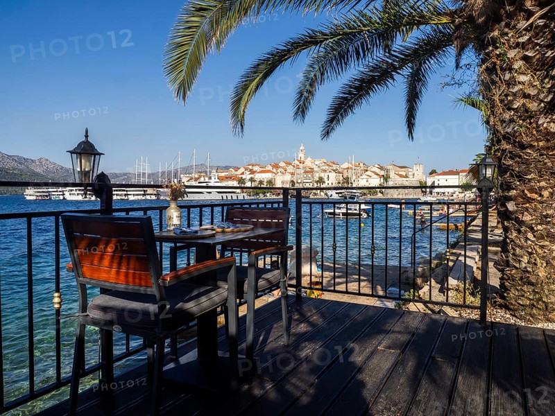 Set restaurant table, Korcula harbour, Korcula island, Dalmatia, Croatia, Europe