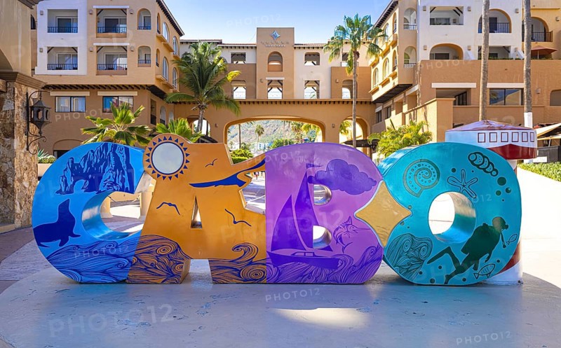 Cabo San Lucas, Los Cabos, Mexico, 2 October, 2021: Los Cabos colorful letters in Cabo San Lucas marina a departure point for cruises, marlin fishing and lancha boats to El Arco Arch and beaches, Central America